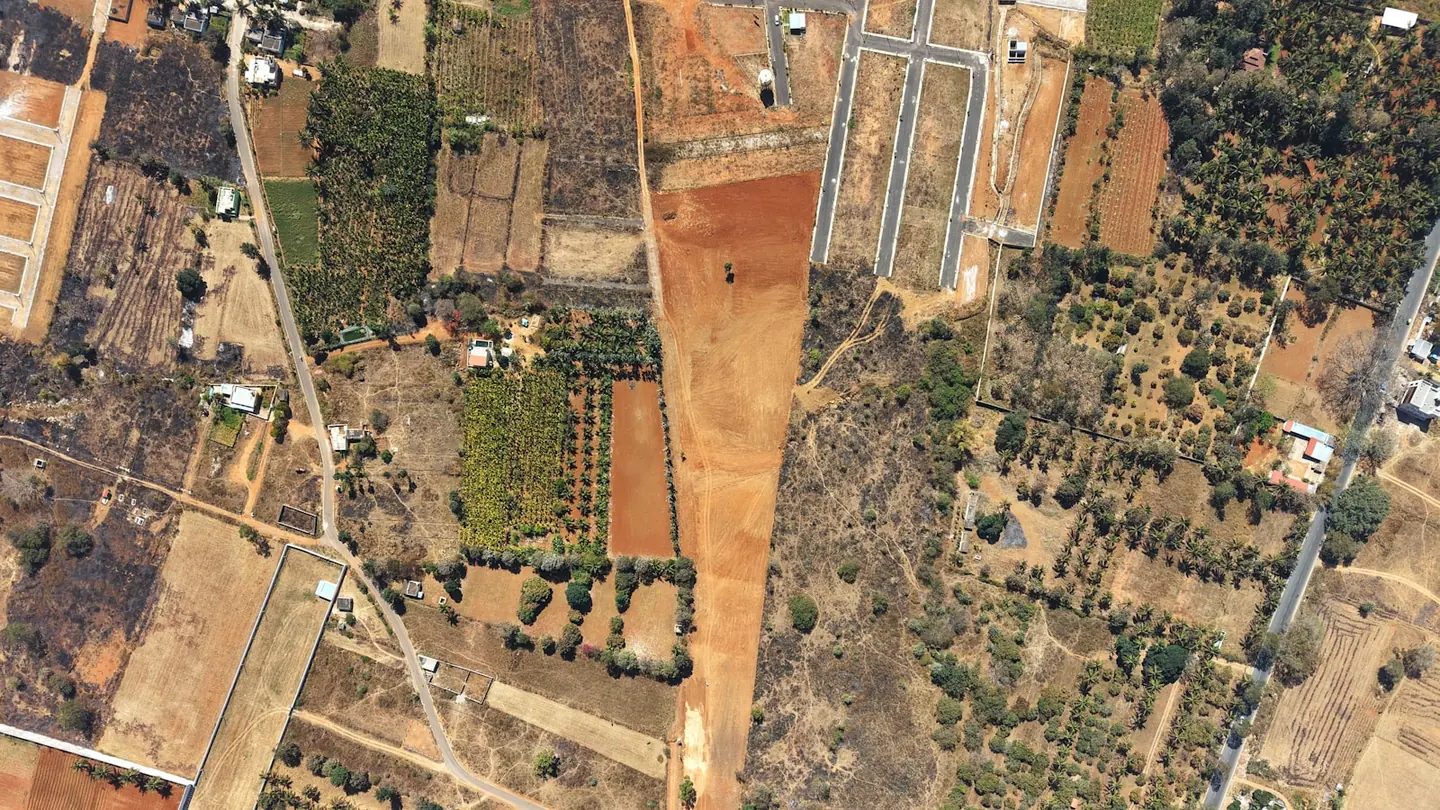 Aerial view of agricultural fields and undeveloped parcels